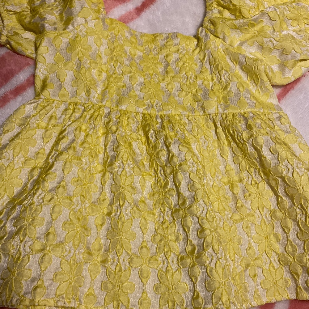 Yellow ruffle shirt